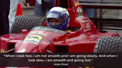 Alain Prost in his Formula 1 car beside his quote on looking fast and going slow