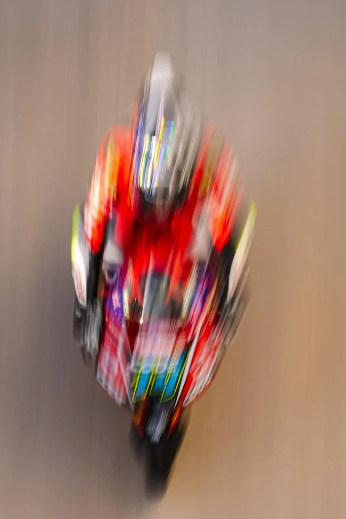 Race bike at extreme speed, head-on motion blur